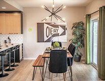 Dining room in the Kingston showhome by Bedrock Homes in Rocha
in the Orchards, Edmonton.