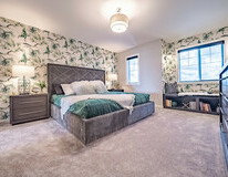 Master bedroom in the Kingston showhome by Bedrock Homes in
Rocha in the Orchards, Edmonton.