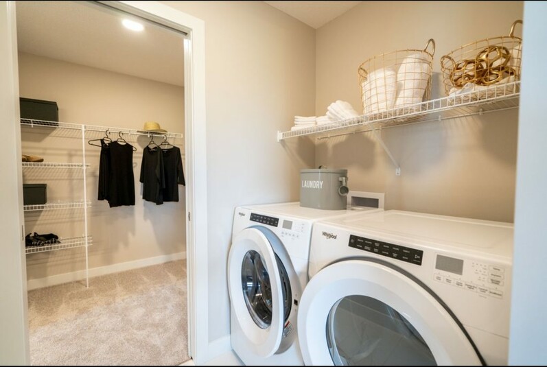 Laundry room in the Chianti showhome by Cantiro Homes in Rocha in the
Orchards, Edmonton.