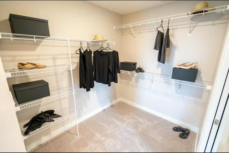 Master walk-in closet in the Chianti showhome by Cantiro Homes in Rocha in the
Orchards, Edmonton.
