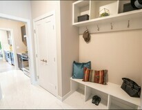 Mudroom in the Chianti showhome by Cantiro Homes in Rocha
in the Orchards, Edmonton.