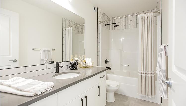 Secondary full bathroom in the Isaiah showhome by San
Rufo Homes in Rocha in the Orchards, Edmonton.