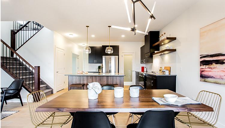 Kitchen and dining room in the Isaiah showhome by San Rufo
Homes in Rocha in the Orchards, Edmonton.
