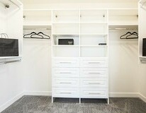 Master walk-in closet in the Isaiah showhome by San Rufo Homes in
Rocha in the Orchards, Edmonton.